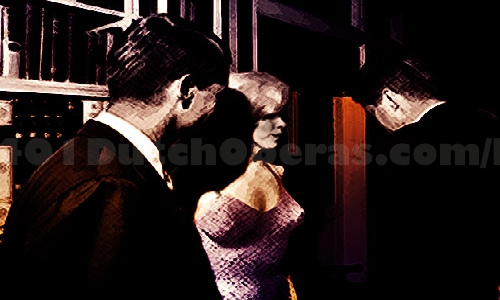 John F Kennedy (right) appears to be turning his head away from Marilyn Monroe as his brother Robert looks on (© Cecil Sloughton b)